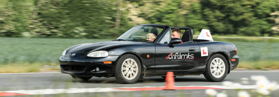 Young driver in a MX5